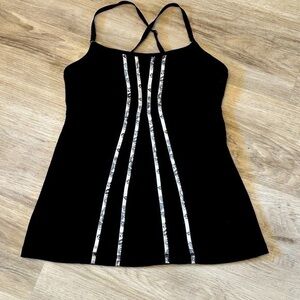 LULULEMON tank top. Built in bra. Adjustable criss cross straps. EEUC. Black